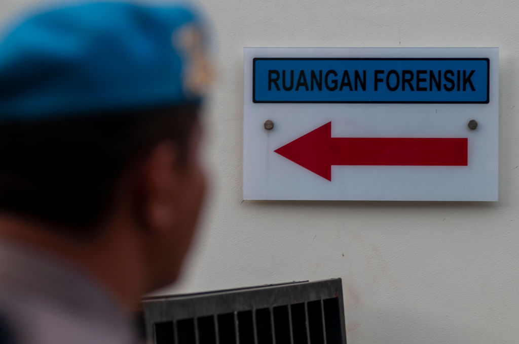 Police guards in Central Sulawesi in March following a gun fight with members of the Eastern Indonesian Mujahidin