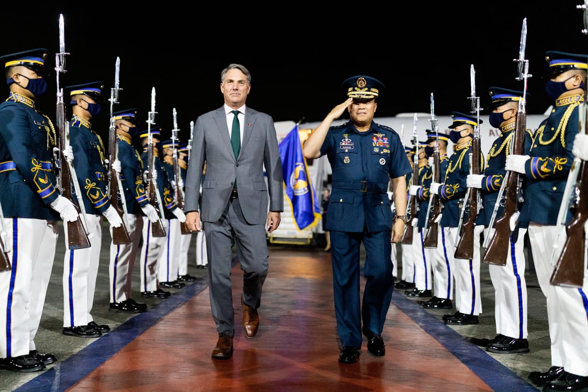 Australian Defence Minister Richard Marles (centre, left) arrives in Manila in February for talks with counterparts (Jay Cronan/Defence Department)