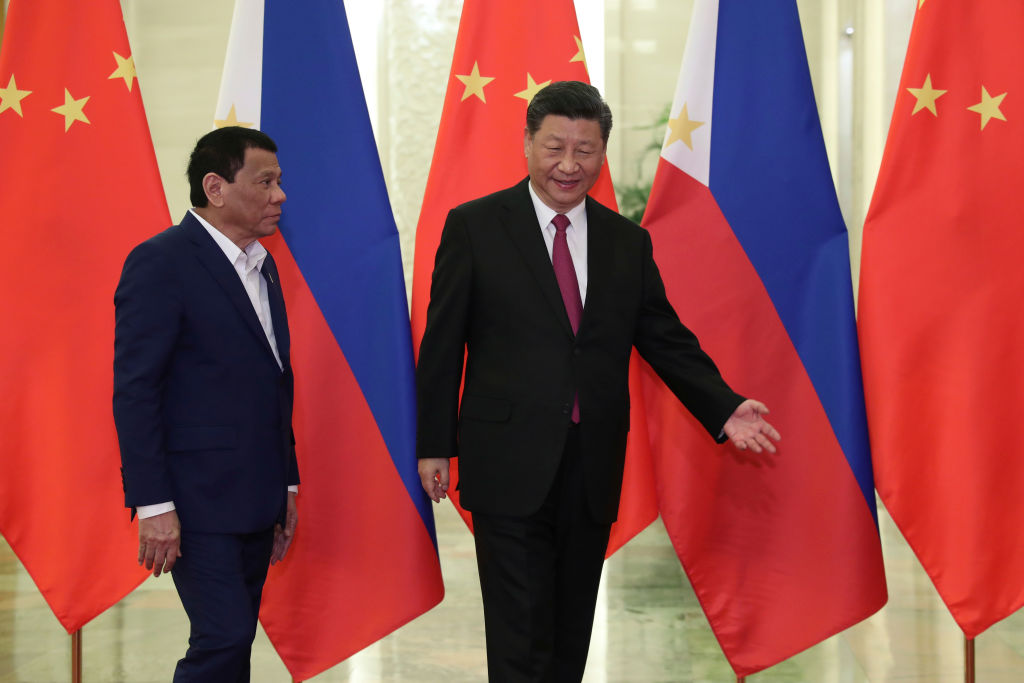Promises unfulfilled: Rodrigo Duterte alongside Xi Jinping in 2019 (Kenzaburo Fukuhara/AFP via Getty Images)