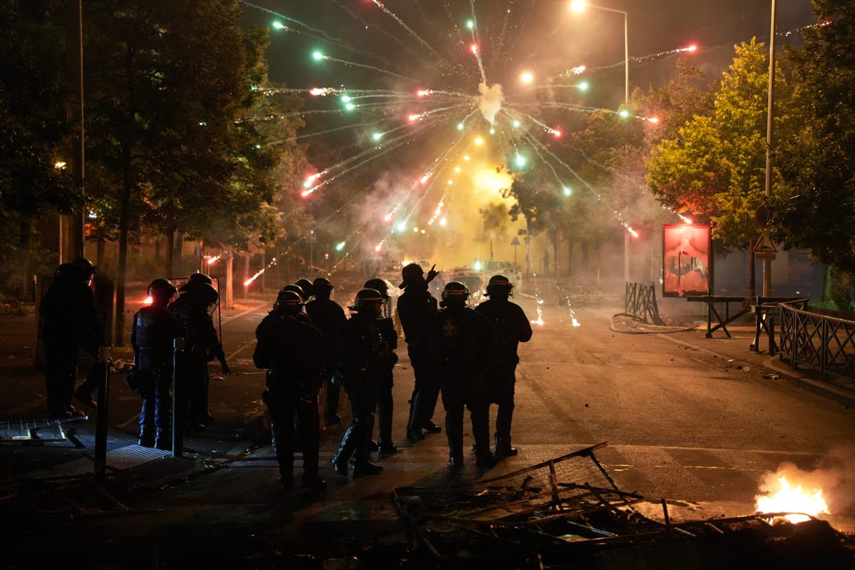 Explosions in the Cite Pablo Picasso area of Nanterre, north-west of Paris, during protests in the days after a 17-year-old man was killed by police (Zakaria Abdelkafi/AFP via Getty Images)