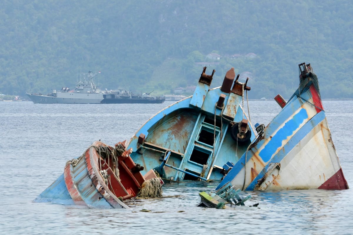 Foreign fishing vessels that have been captured and sunk in Natuna waters near Lagong island in Riau Islands province, Indonesia (Bay Ismoyo/AFP via Getty Images)