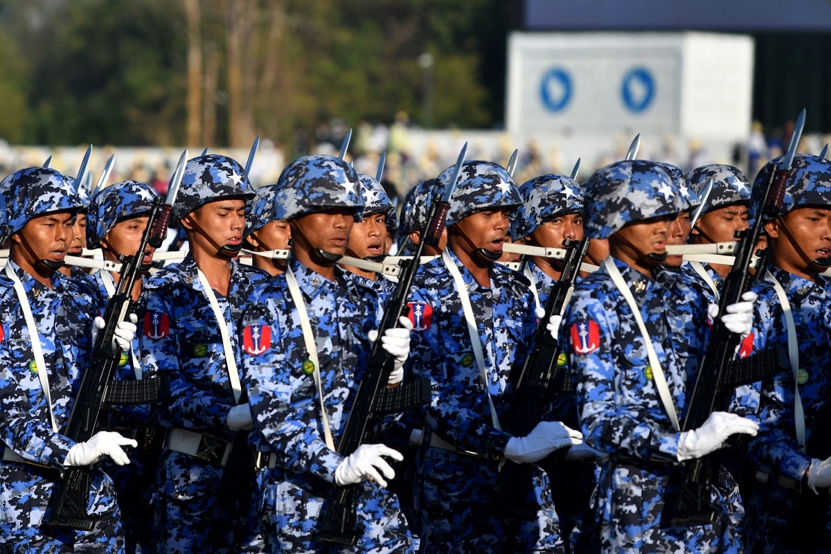 Members of the Myanmar military march at a parade ground to mark the country's Independence Day in Naypyidaw on January 4, 2023. - Myanmar's junta announced an amnesty for 7,000 prisoners to mark Independence Day on January 4 following a show of force in the capital, days after increasing democracy figurehead Aung San Suu Kyi's jail term to 33 years. (Photo by AFP) (Photo by STR/AFP via Getty Images)