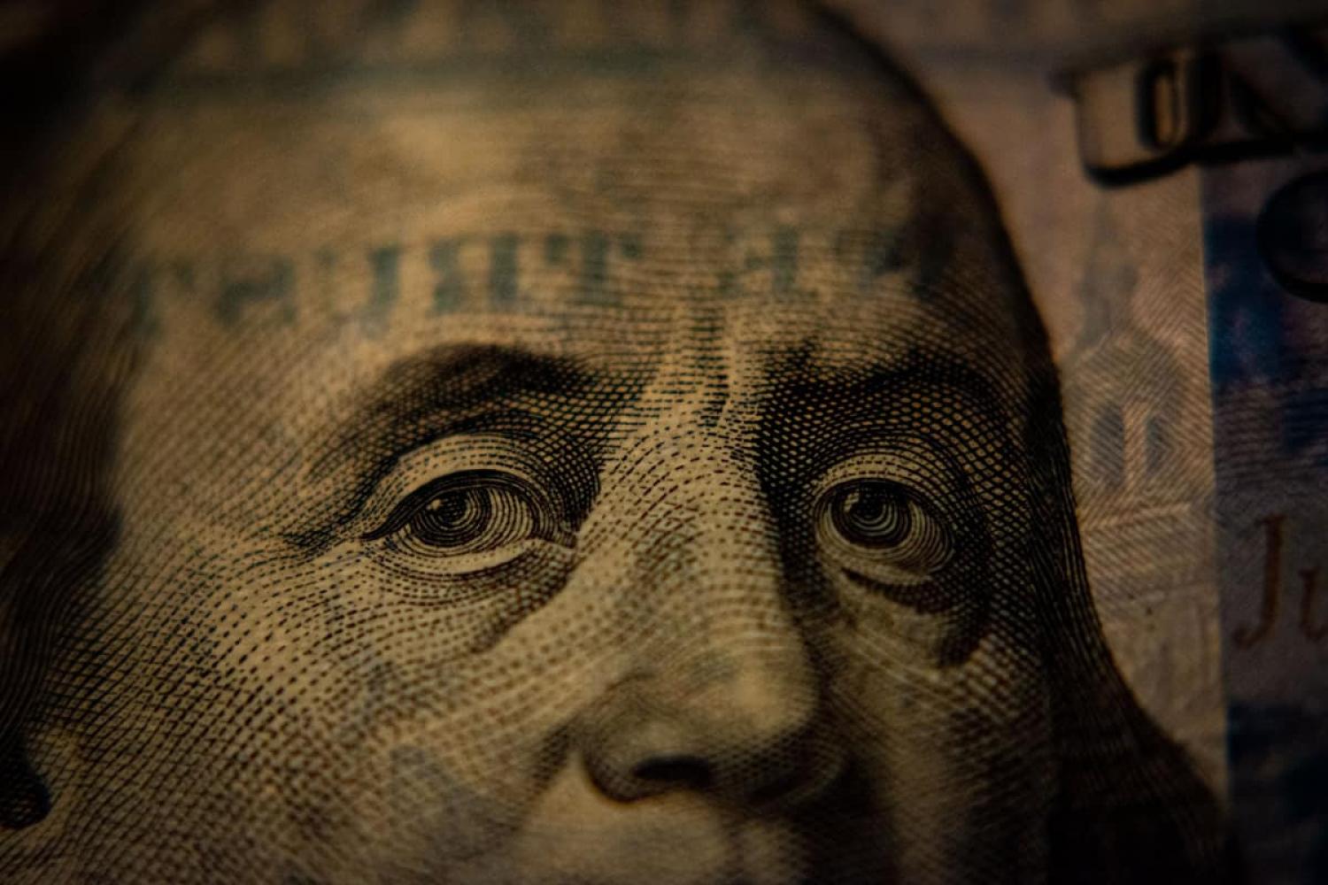 As rates rise and the US dollar strengthens, the debt burden becomes greater and riskier (Adam/Unsplash)