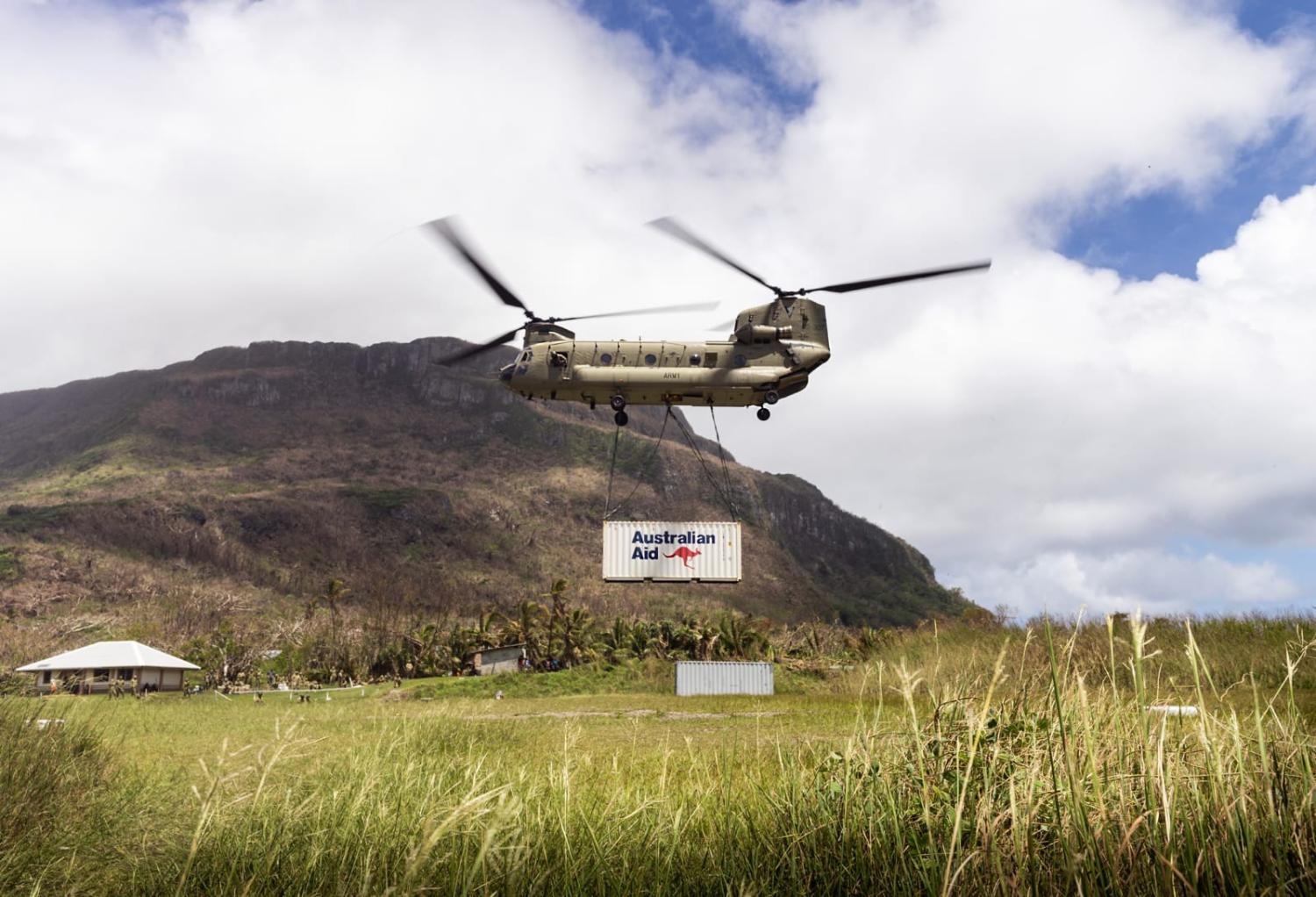An Australian Army CH-47 Chinook helicopter delivers aid stores to Futuna Island, Vanuatu, in March (Daniel Goodman/Defence Department)