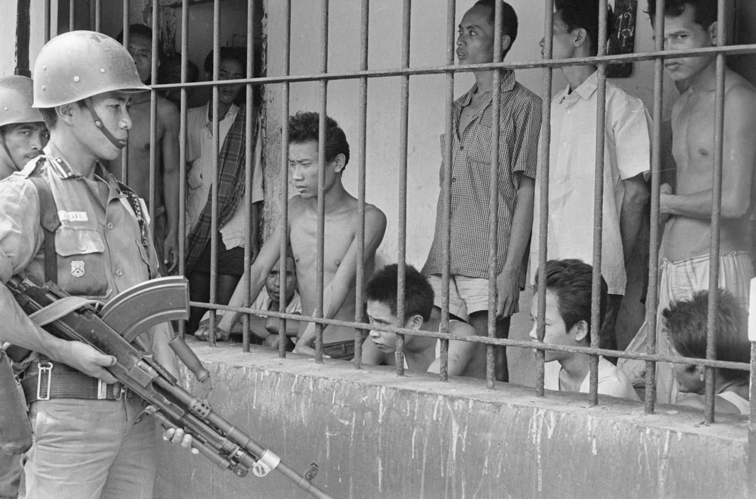 Soldiers holding suspected communists at Tangerang, Jakarta, in December 1965 (Bettmann via Getty Images)