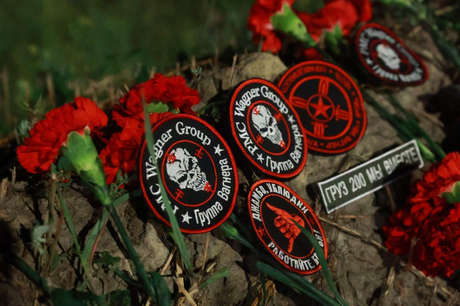A makeshift memorial in front of the "PMC Wagner Centre" in Saint Petersburg, early on 24 August (AFP via Getty Images)