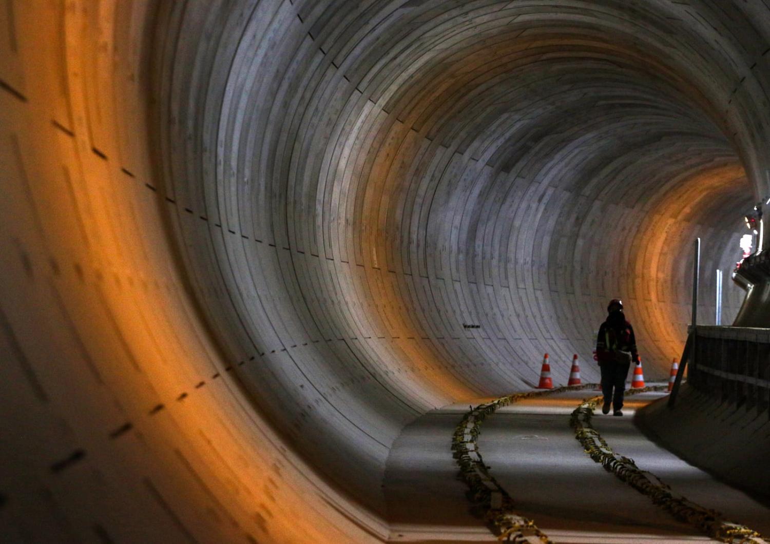 Works inside the Mass Rapid Transit (MRT) phase 2 construction at the National Monument (Monas) station in Jakarta - a construction project between Indonesia and Japan expected to be operational in 2027 (Eko Siswo via Getty Images)