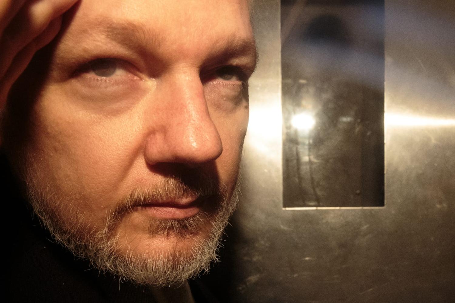 Julian Assange leaves court in London in 2019 after being sentenced breaching his bail conditions when he took refuge in the Ecuadorian Embassy in 2012 (Jack Taylor/Getty Images)