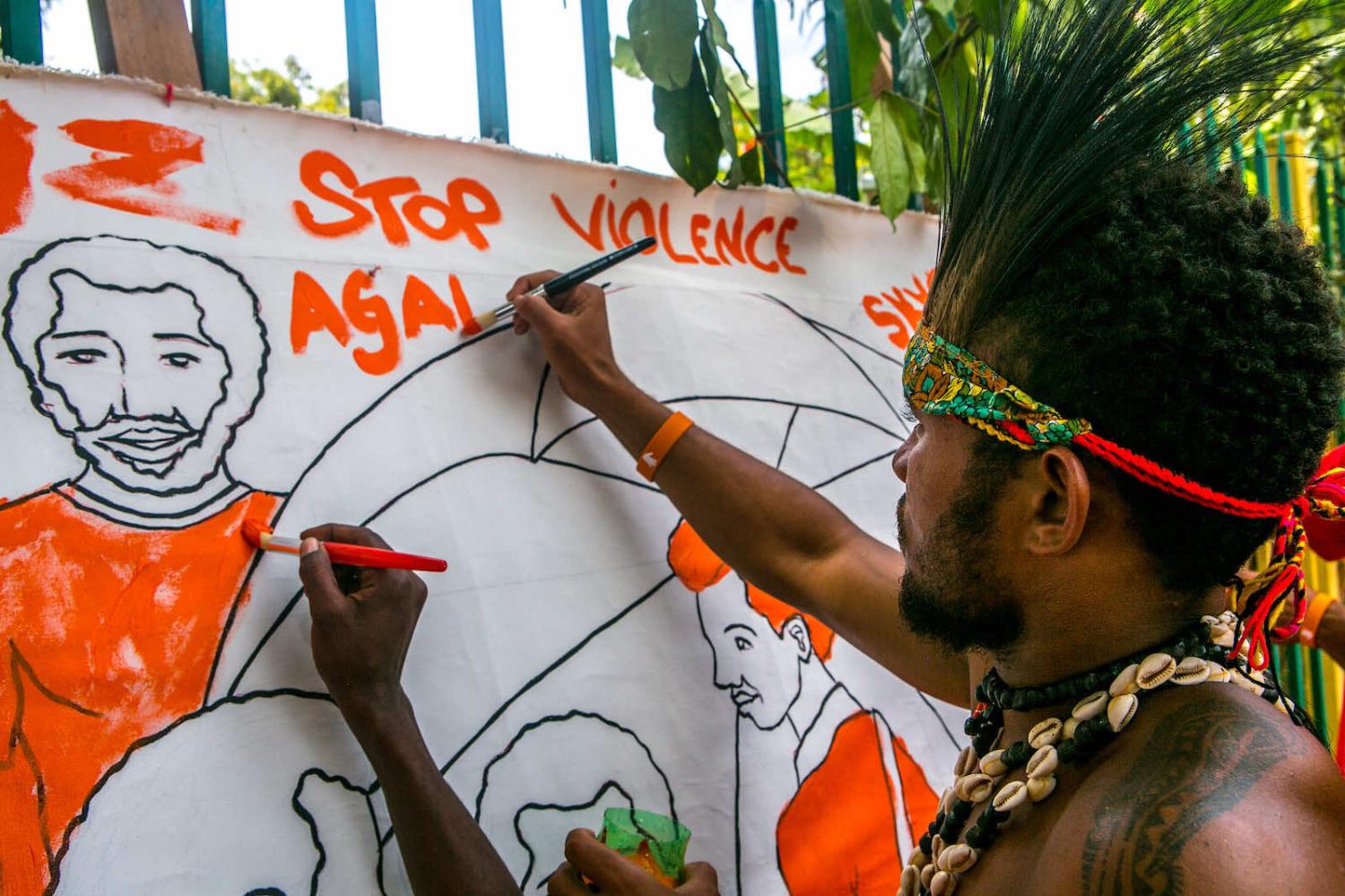 Participants in a UN Women 2016 campaign for “activism against gender-based violence” in Papua New Guinea (Johaness Terra/UN Women Asia and the Pacific/Flickr)