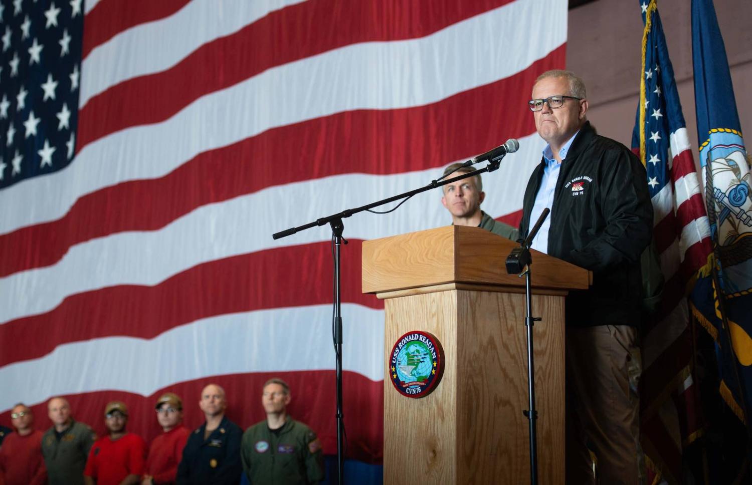 Prime Minister Scott Morrison addresses sailors aboard the aircraft carrier USS Ronald Reagan in July (Photo: Official US Navy Page/Flickr)