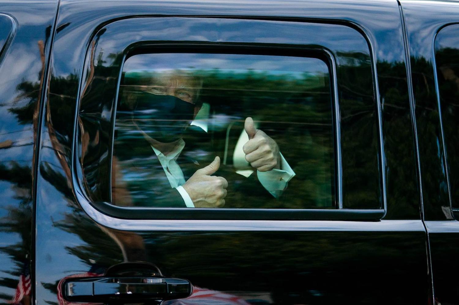 A drive-by while undergoing hospital treatment for Covid-19, 4 October 2020 in Bethesda, Maryland (The White House/Flickr)