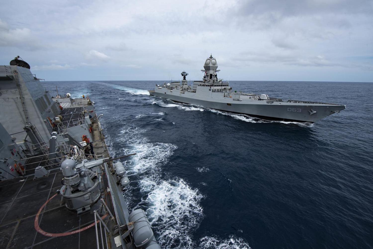 The Indian Navy destroyer INS Kolkata alongside guided-missile destroyer USS Sterett during Exercise Malabar, November 2020 (US Pacific Fleet/Flickr)