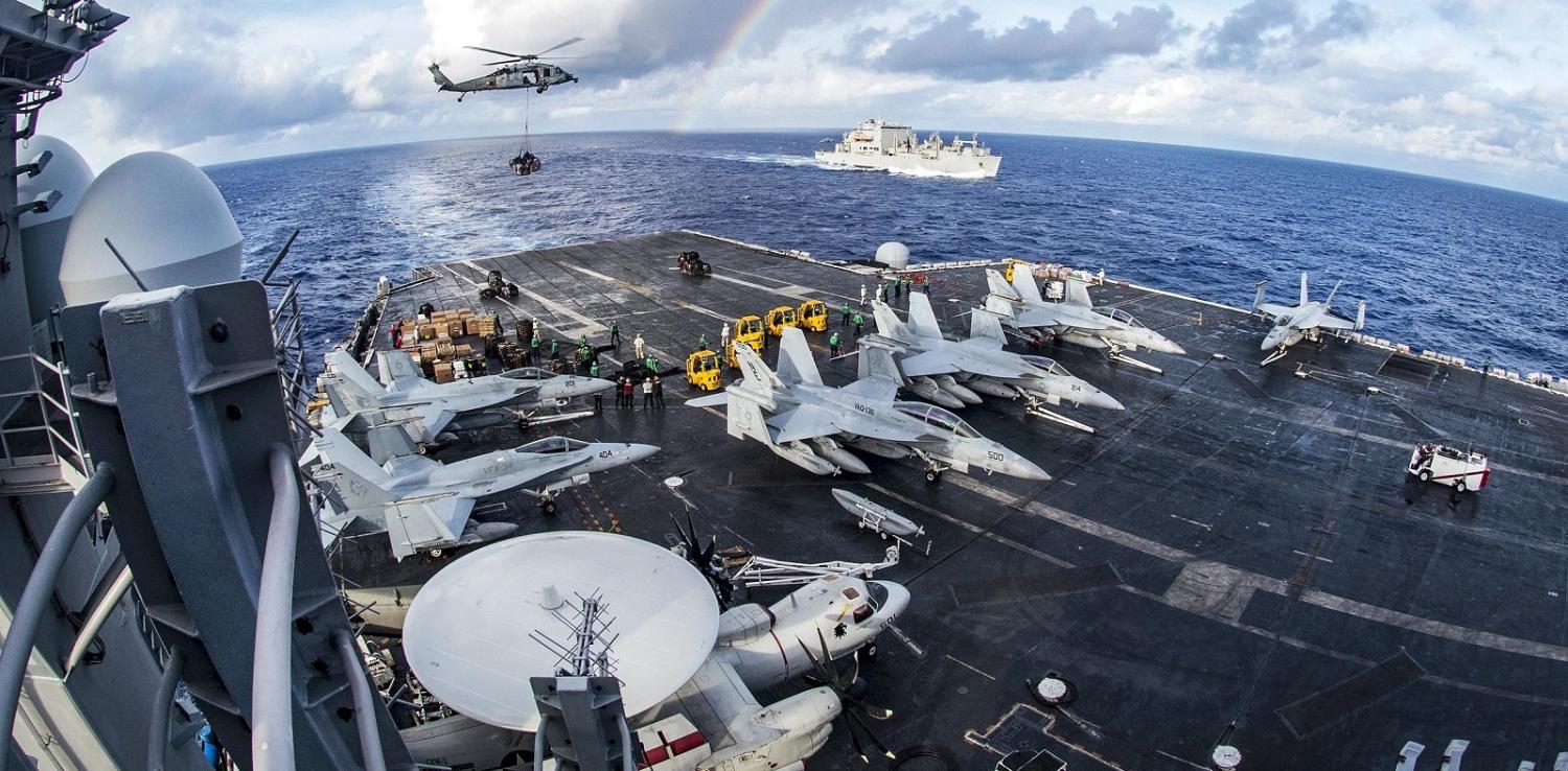 The USS Carl Vinson in a vertical replenishment with Helicopter Sea Combat Squadron 4 and the USNS Charles Drew (Photo: US Dept of Defense)