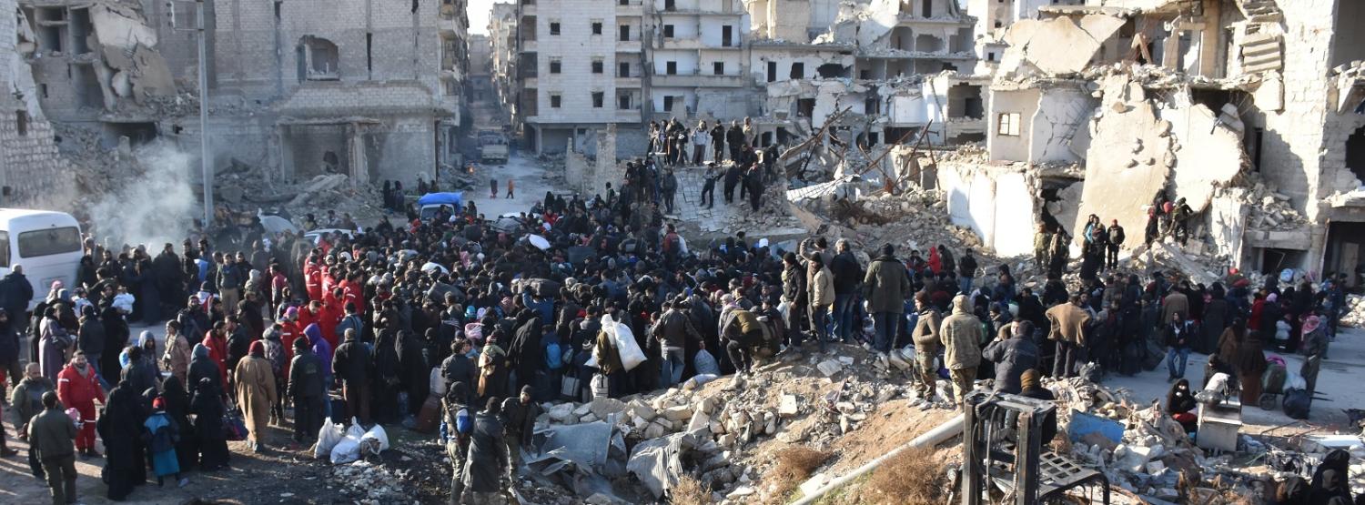 Civilians wait to be evacuated from East Aleppo (Photo: Mustafa Sultan/Getty Images)