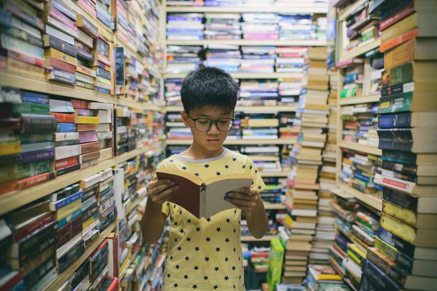 A young reader in George Town, Malaysia (Photo: Jordan Lye/Getty Images)