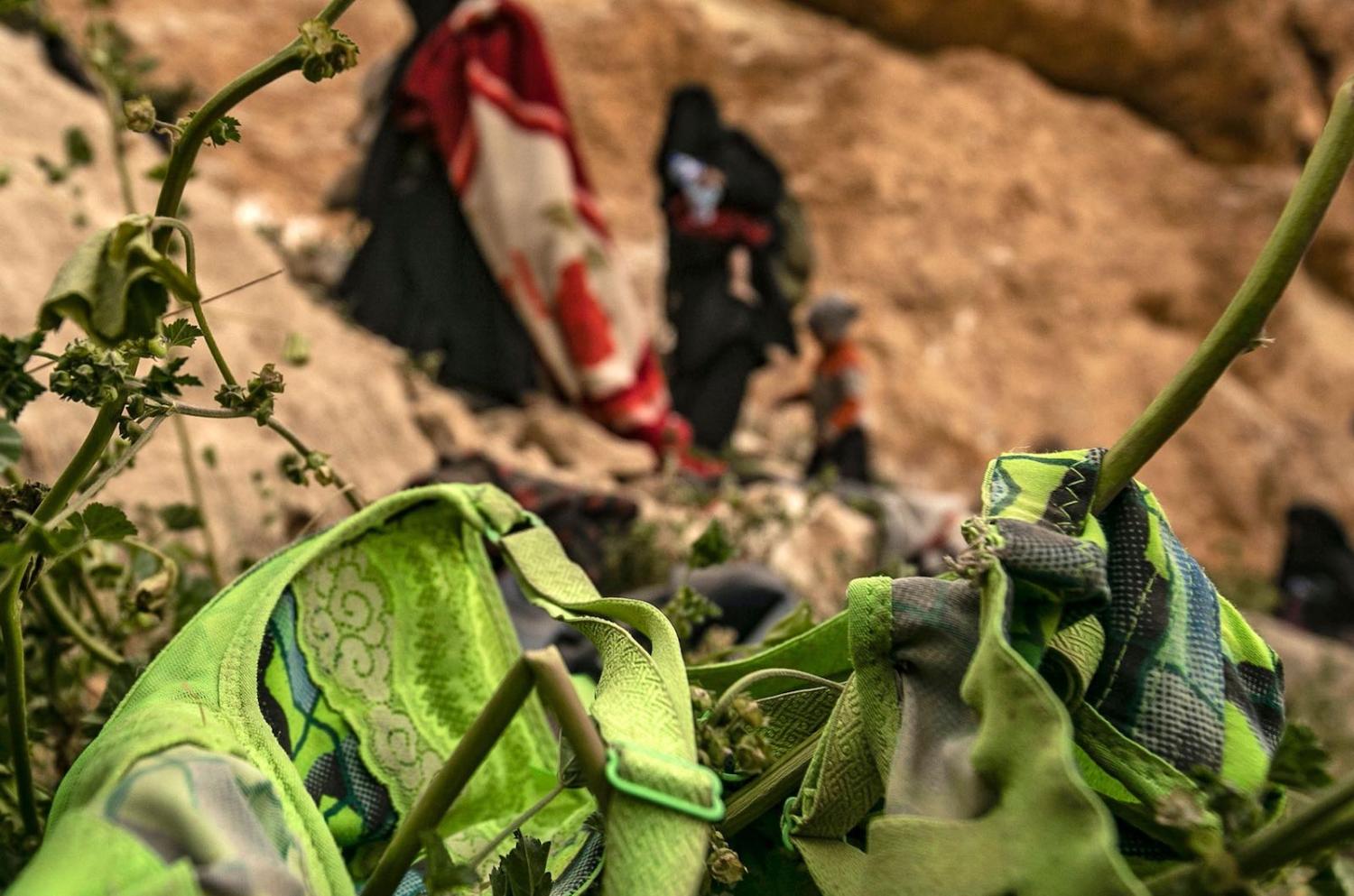 Alleged ISIS members near the village of Baghouz, Syria, in March (Photo: Delil Souleiman via Getty)