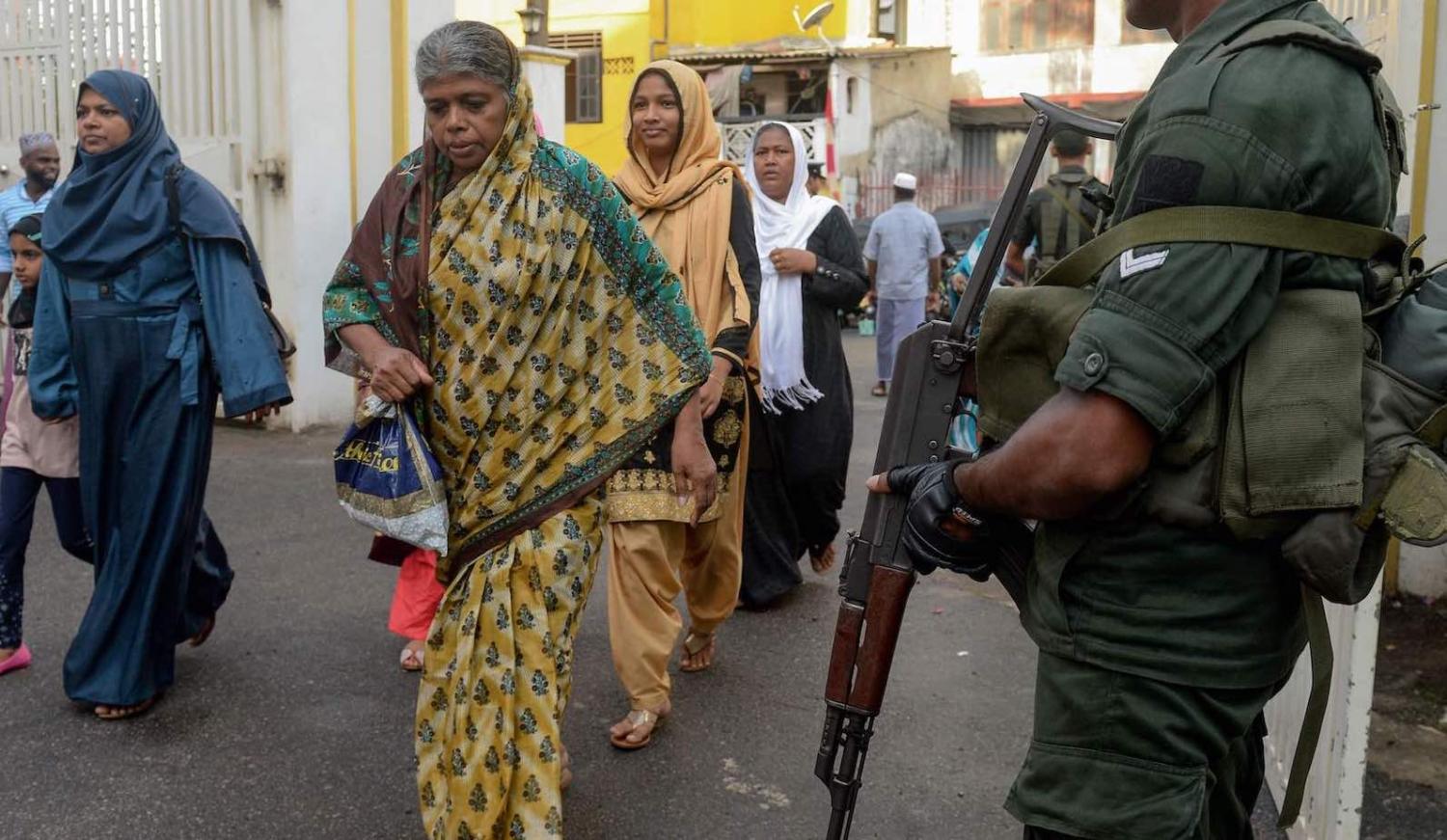 Sri Lankan troops guard for Eid al-Fitr at the Grand Mosque in Colombo on 5 June (Photo: Lakruwan Wanniiarachchi via Getty)