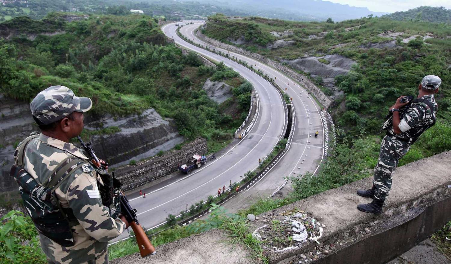Indian troops standing guard this month on the Jammu-Srinagar highway in Nagrota near Jammu (Photo: Rakesh Bakshi via Getty)
