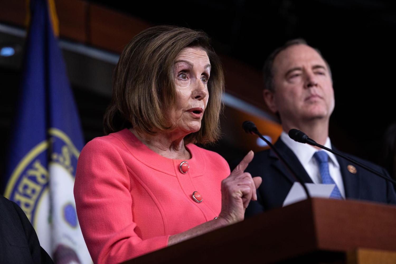 US House Speaker Nancy Pelosi announces vote on sending impeachment articles to the Senate, while Rep. Adam Schiff looks on (Photo: Aurora Samperio/NurPhoto via Getty Images)