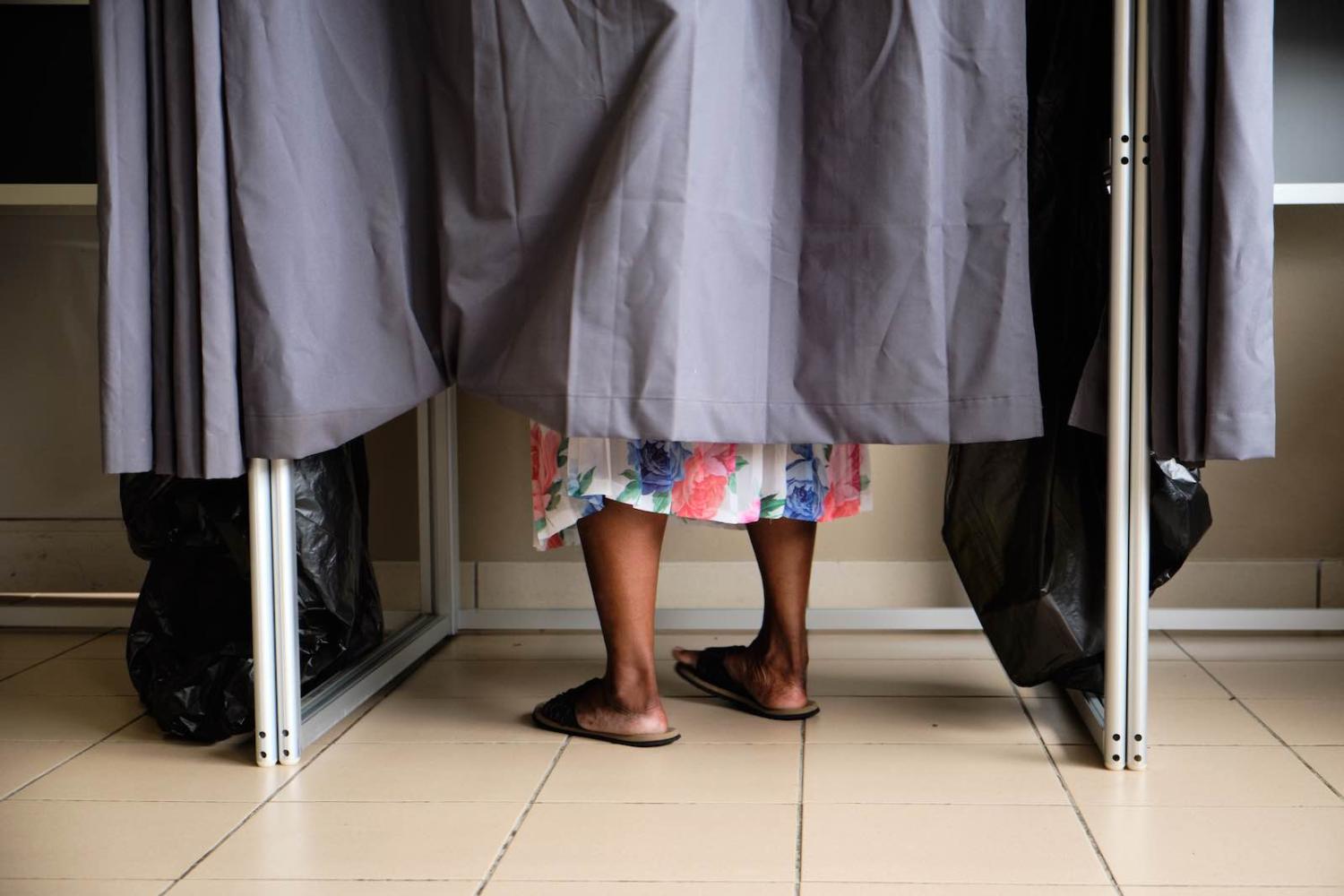Voting in Noumea, New Caledonia, during the first round of mayoral elections in France in March (Theo Rouby/AFP via Getty Images)