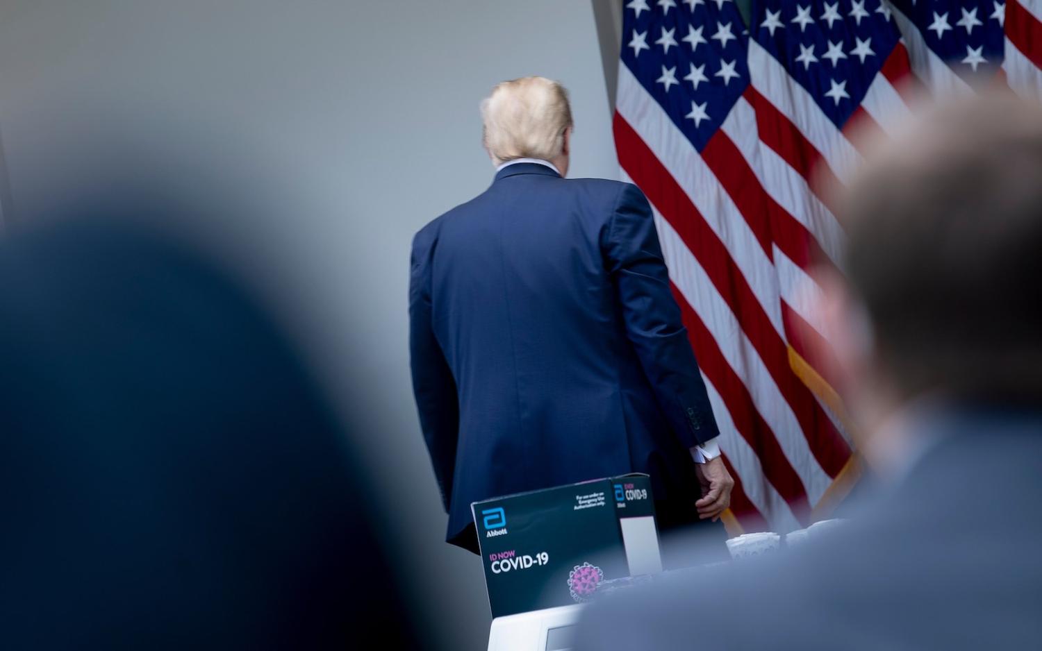 US President Donald Trump walks out of a news conference on Covid-19 held in the Rose Garden of the White House, Washington, 11 May (Brendan Smialowski/AFP via Getty Images)