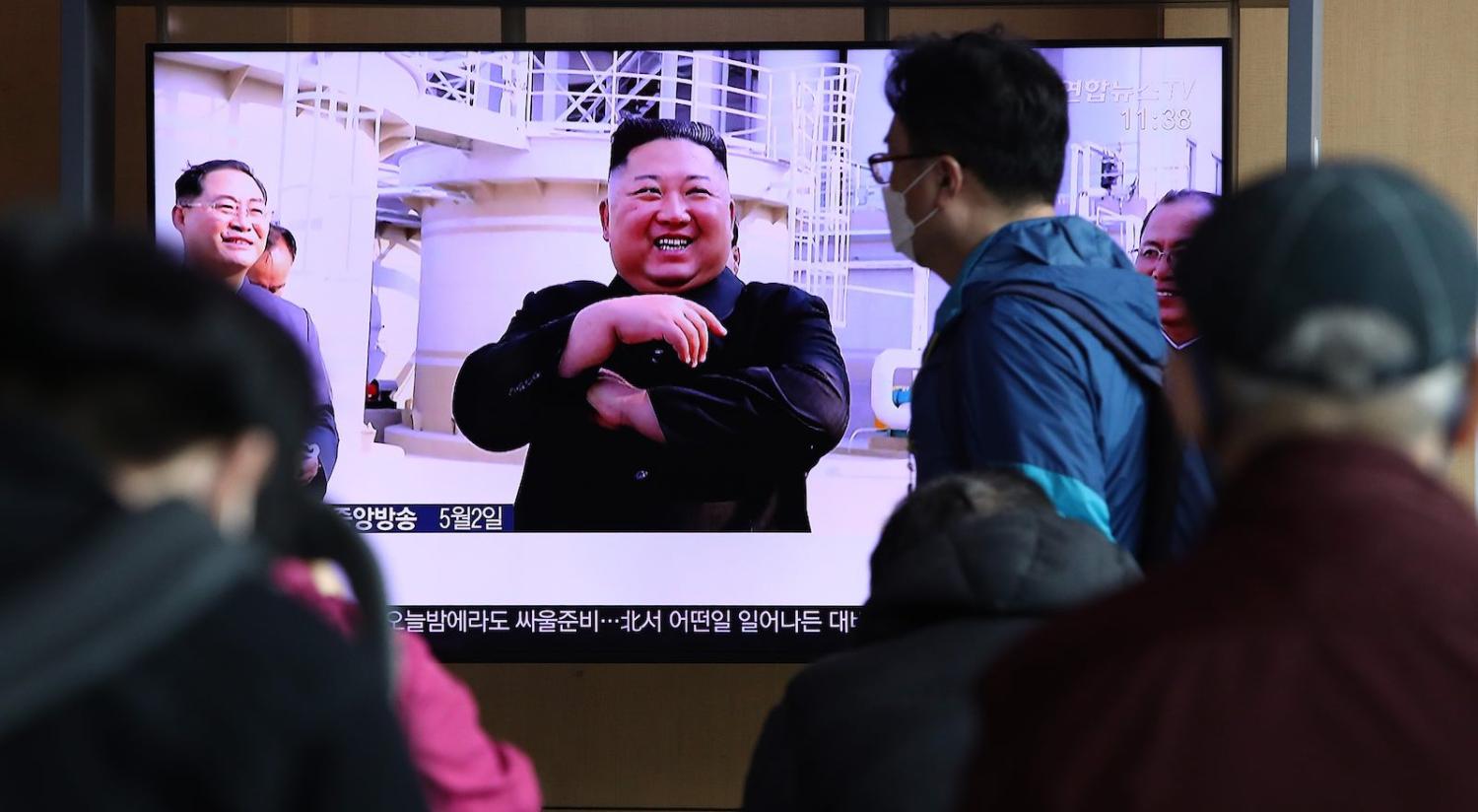 North Korean leader Kim Jong-un seen on televisions in South Korea on 2 May (Chung Sung-Jun/Getty Images)