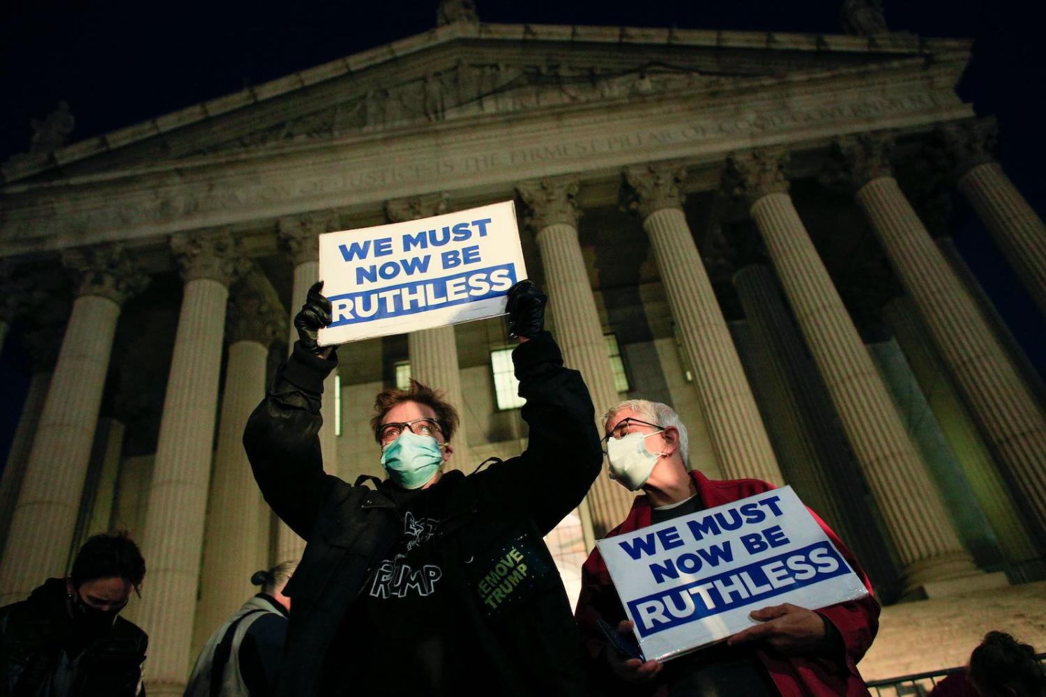 Demonstrators at the New York State Civil Supreme Court building in New York City, 19 September 2020 (Kena Betancur/AFP via Getty Images)