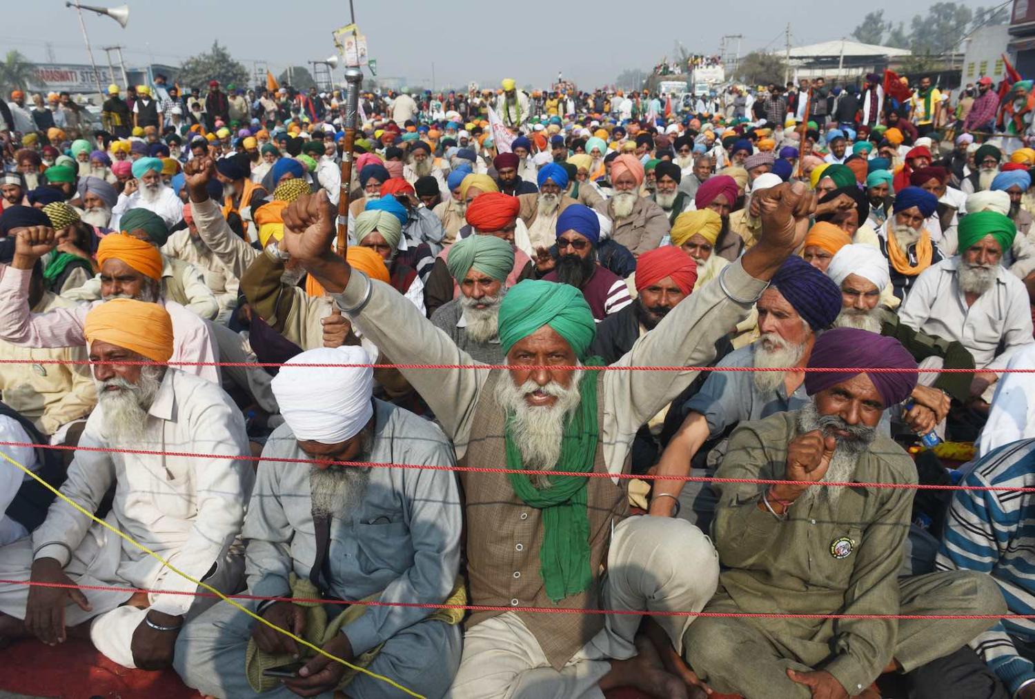 Farmers protesting India’s farm reform laws on 1 December in New Delhi (Vipin Kumar/Hindustan Times via Getty Images)