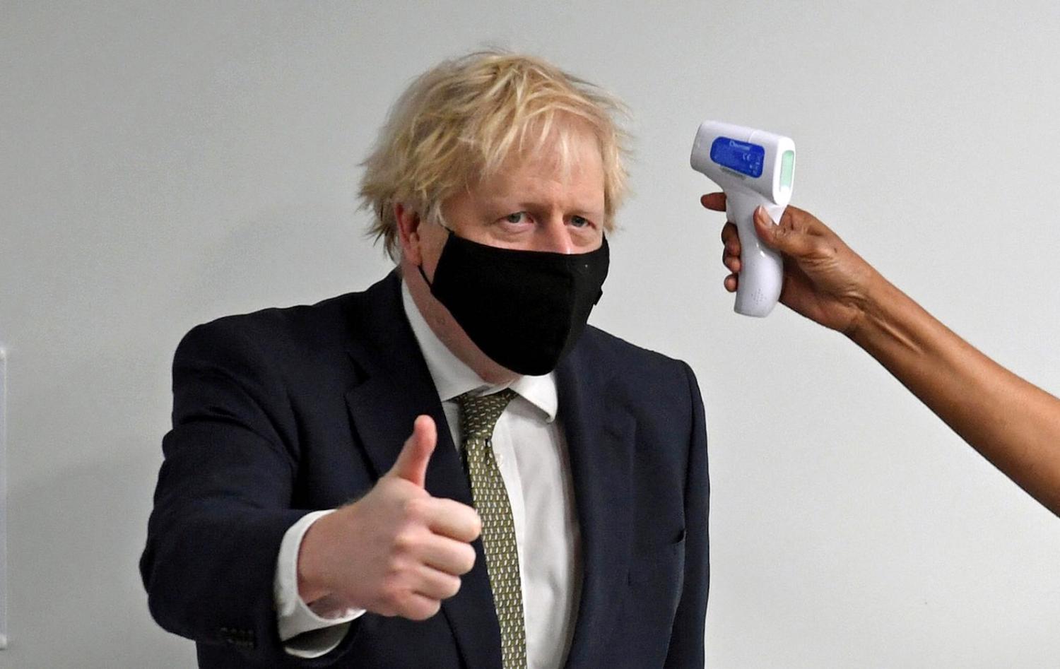 UK Prime Minister Boris Johnson visiting a London hospital on 4 January (Stefan Rousseau/Pool/AFP via Getty Images))