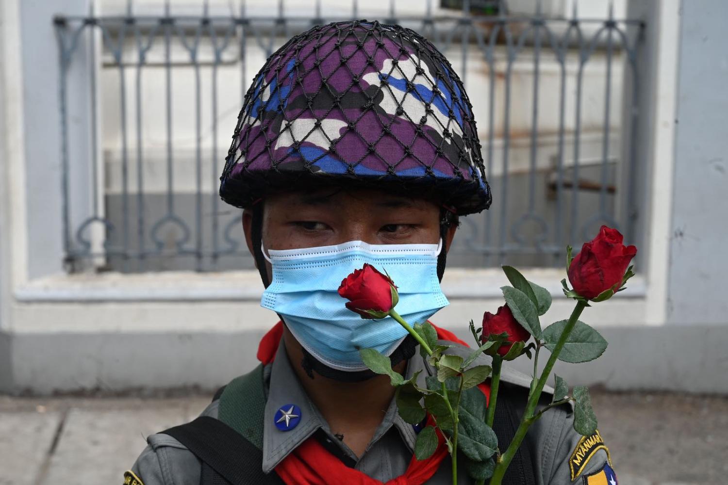 A policeman during a demonstration against the military coup, Yangon, 7 February (STR/AFP via Getty Images)