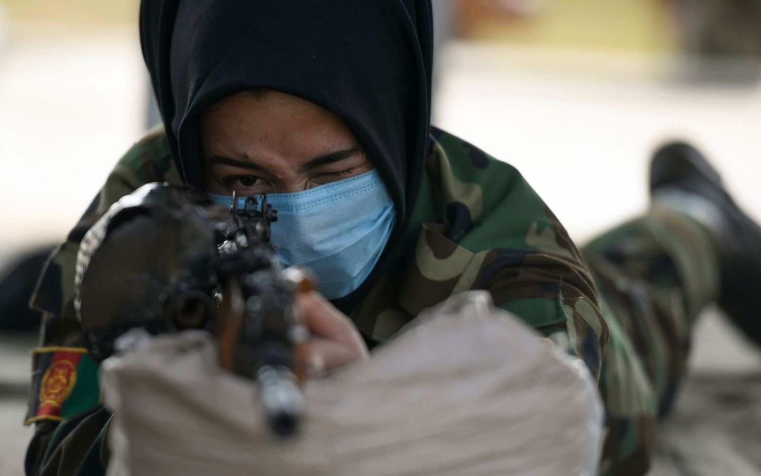 An Afghan cadet takes part in a firing exercise during a training programme at the Officers Training Academy in Chennai, India, in February (Arun Sankar/AFP with Getty Images)