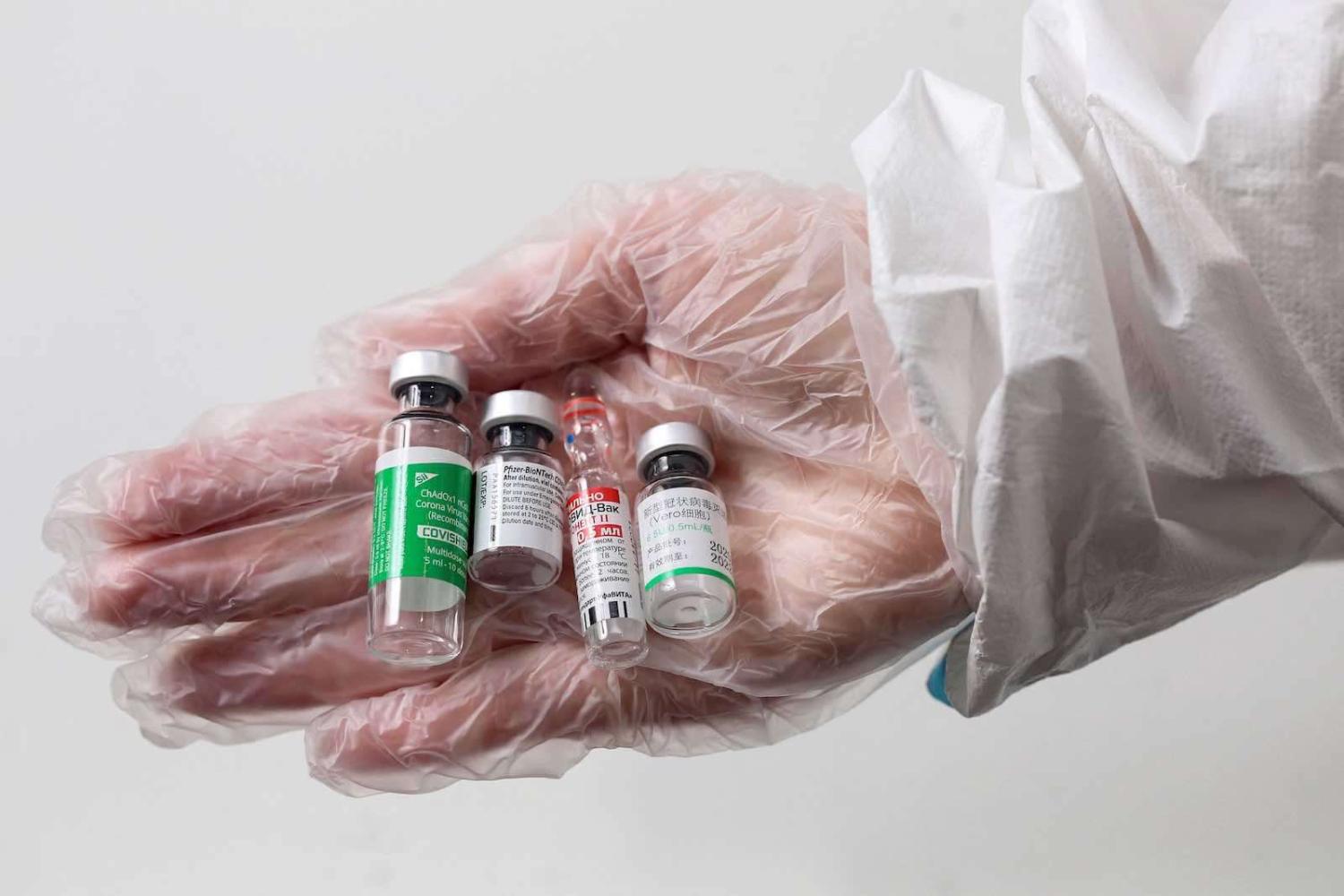 Vials of Covid-19 vaccines produced by (from left) Oxford-AstraZeneca (India’s Covishield), Pfizer-BioNTech, Sputnik V and Sinopharm, at the Belgrade fair vaccination centre in Belgrade, Serbia (Oliver Bunic/AFP via Getty Images)