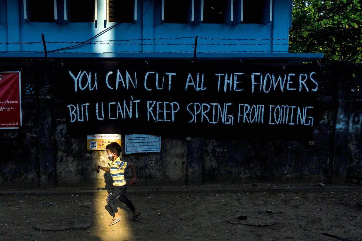 A banner put up by activists in Yangon in April to protest the military coup in Myanmar (STR/AFP via Getty Images)