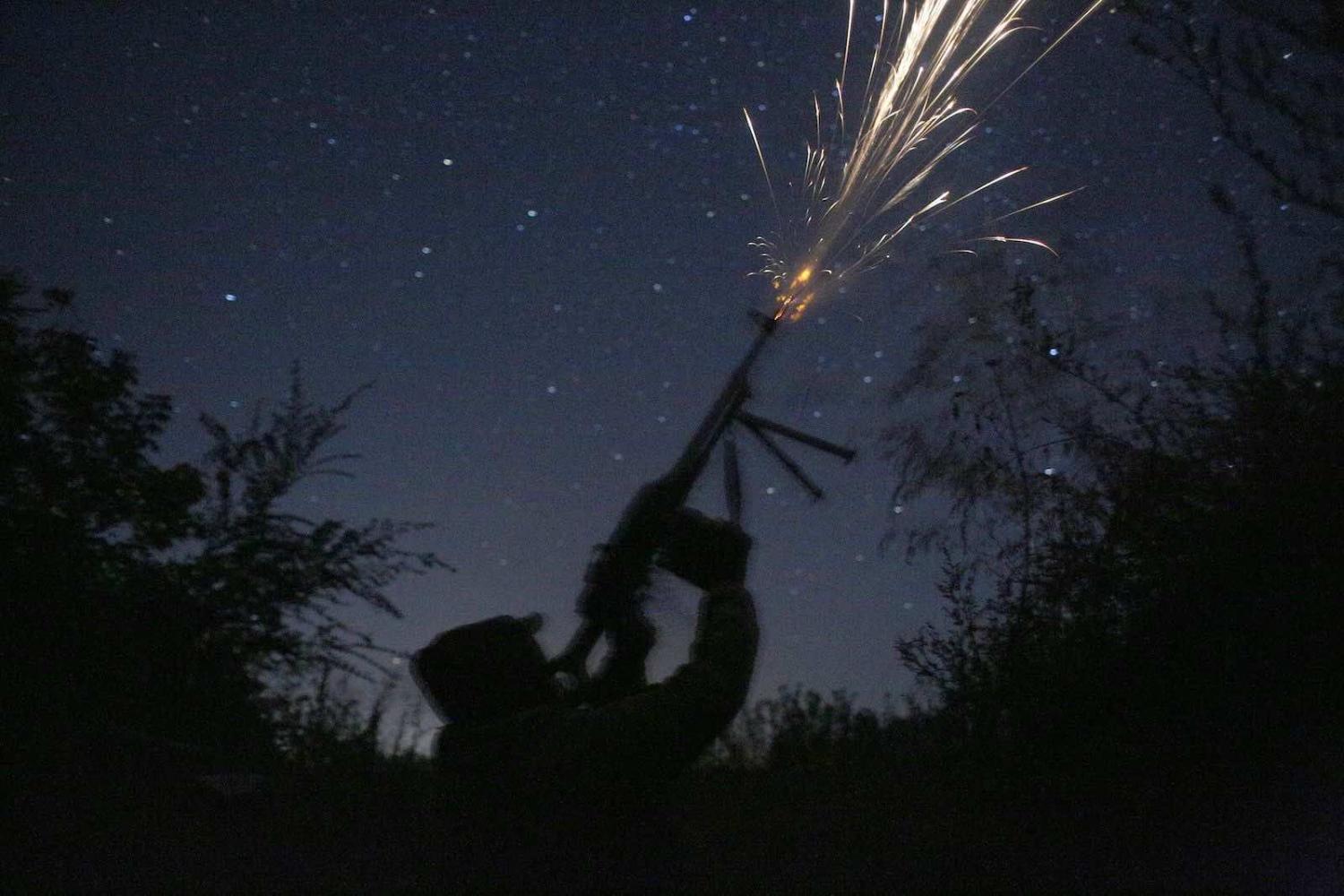 A Ukrainian soldier fires at a drone in September last year in Donetsk region near the frontline with Russia-backed separatists (Anatolii Stepanov/AFP via Getty Images)