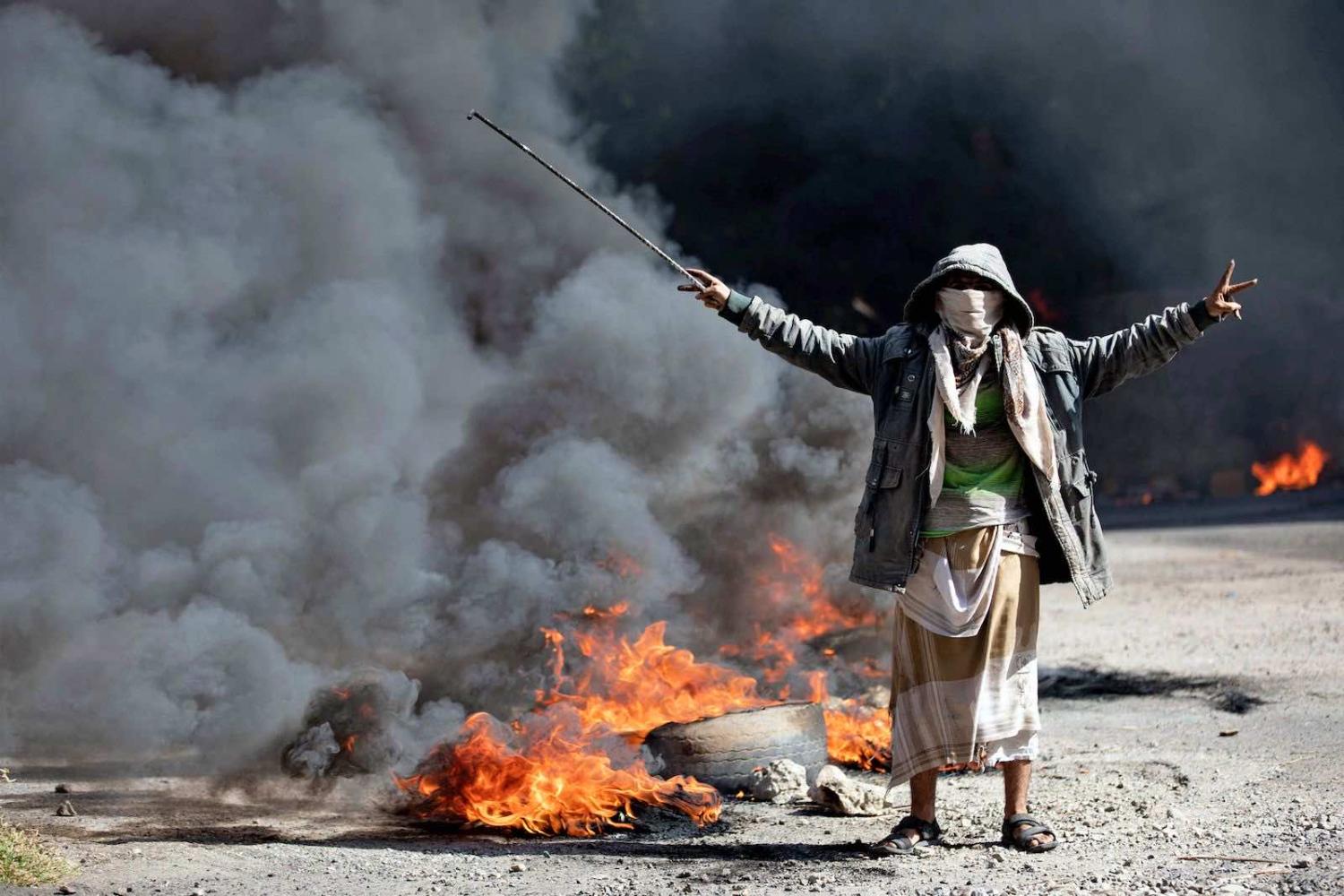 Protests in the Yemeni city of Taez calling for the removal of the Saudi-backed coalition government, 27 September (Ahmad al-Basha/AFP via Getty Images)