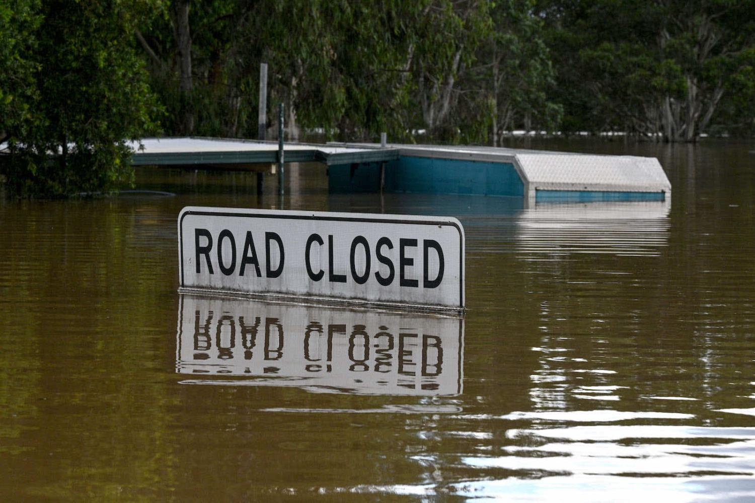 A home inundated from an overflowing Hawkesbury River is pictured in the Windsor suburb of Sydney on 9 March (Saeed Khan/AFP via Getty Images)