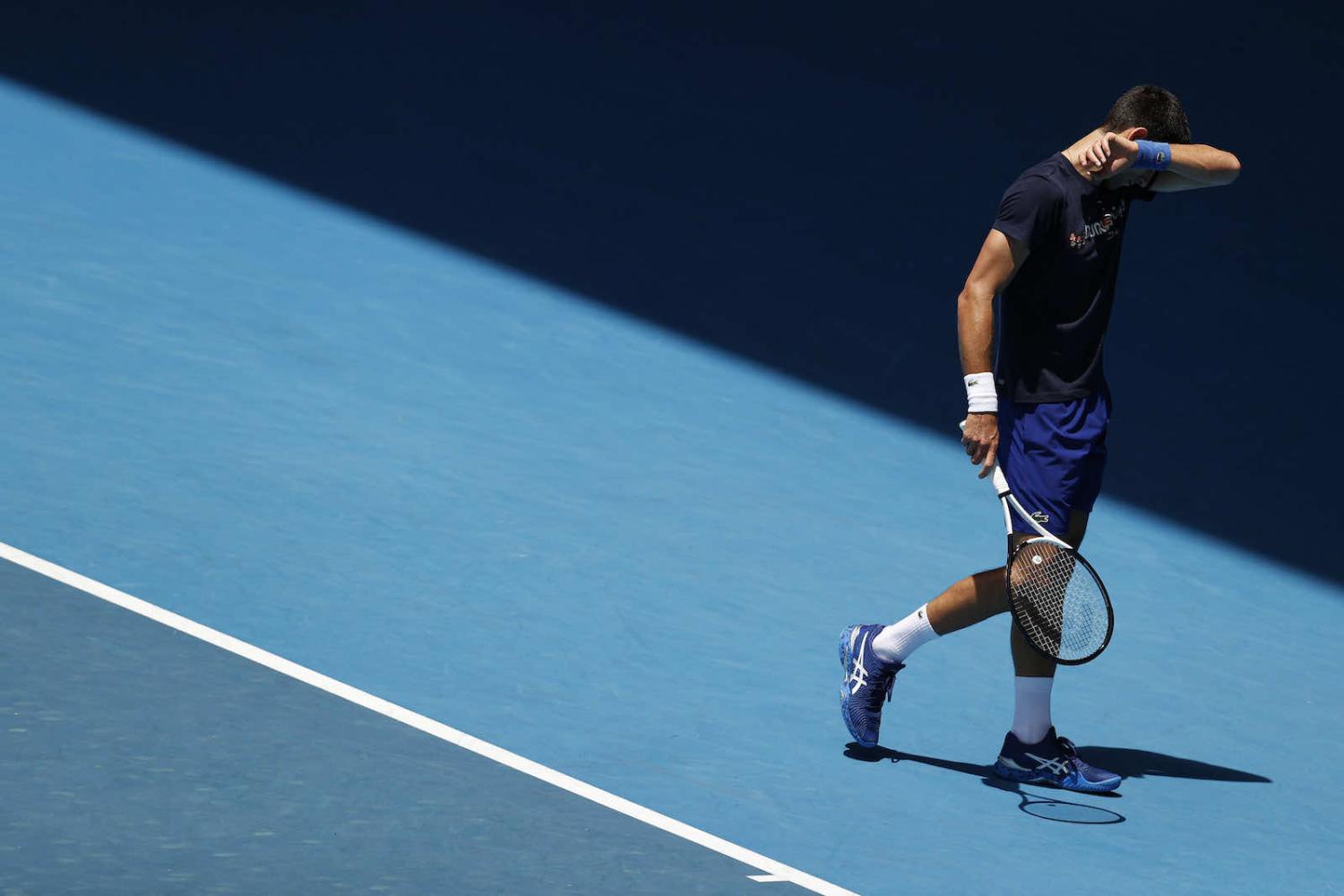 Novak Djokovic of Serbia is seen during a practice session ahead of the 2022 Australian Open at Melbourne Park on 12 January in Melbourne – his visa was cancelled two days later (Darrian Traynor/Getty Images)