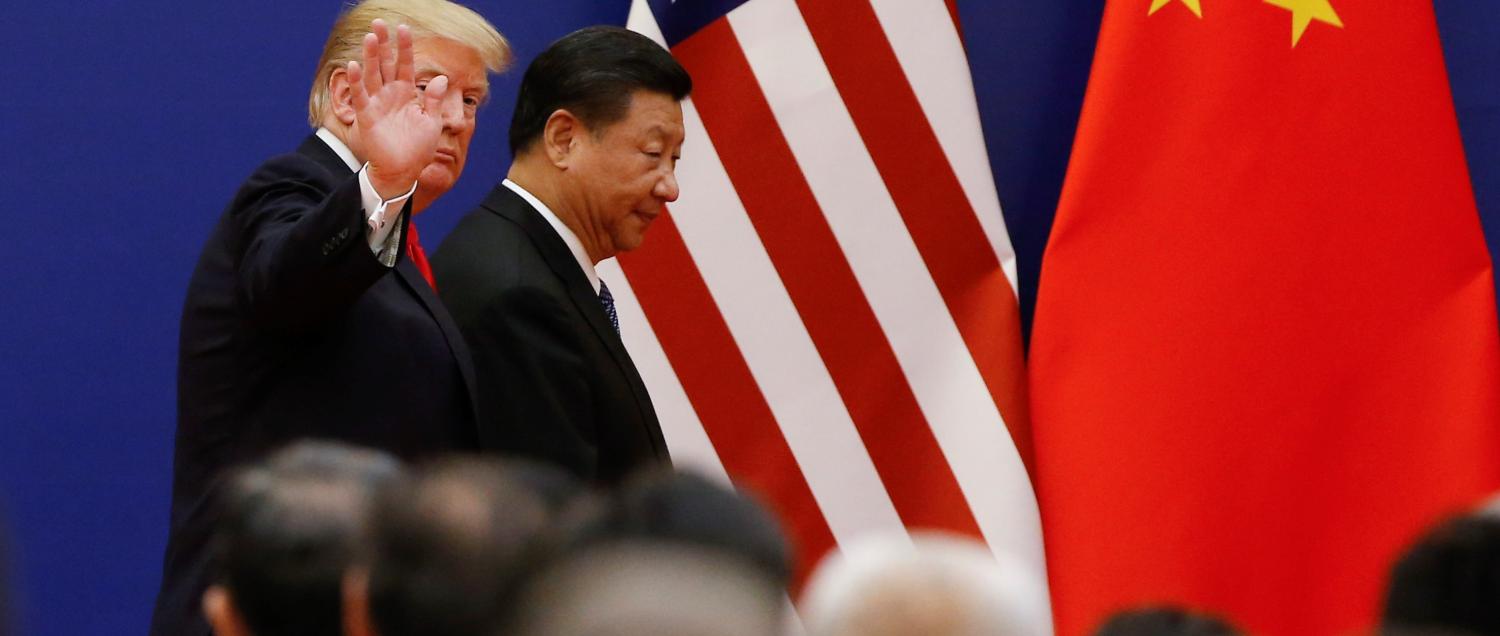 Presidents Donald Trump and Xi Jinping meeting in Beijing, November 2017 (Photo: Thomas Peter-Pool/Getty Images)