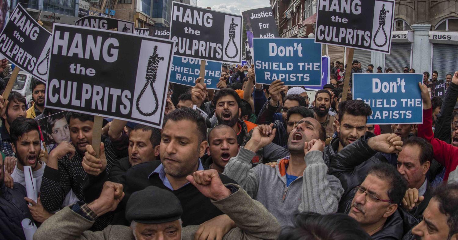 Protesters in Kashmir shout “Death to rapists” on 21 April (Photo: Yawar Nazir/Getty)