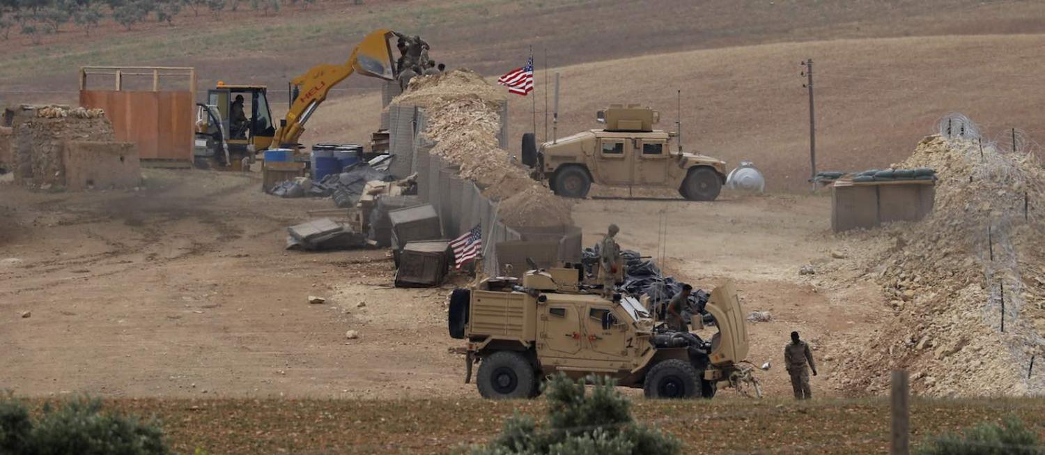 Vehicles and structures of US-backed coalition forces in the northern Syrian town of Manbij, in May (Photo: Delil Souleiman via Getty)