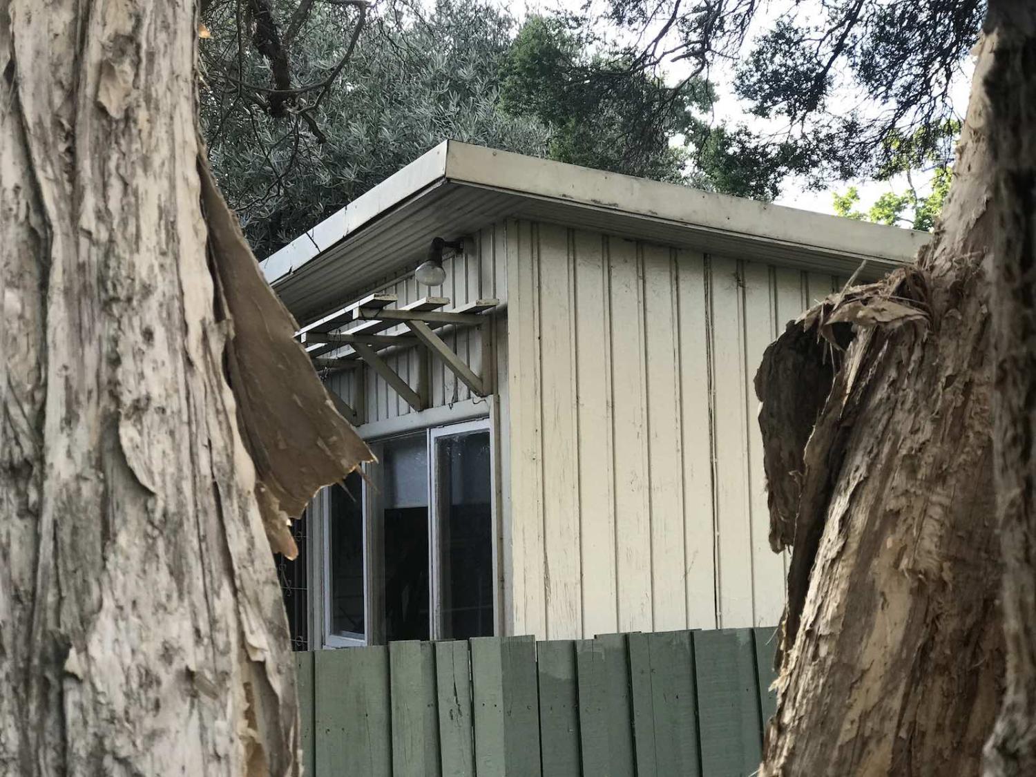 A Bligh St knock-off it’s not: Social distancing in “shed life”, the view across the back fence to Interpreter HQ