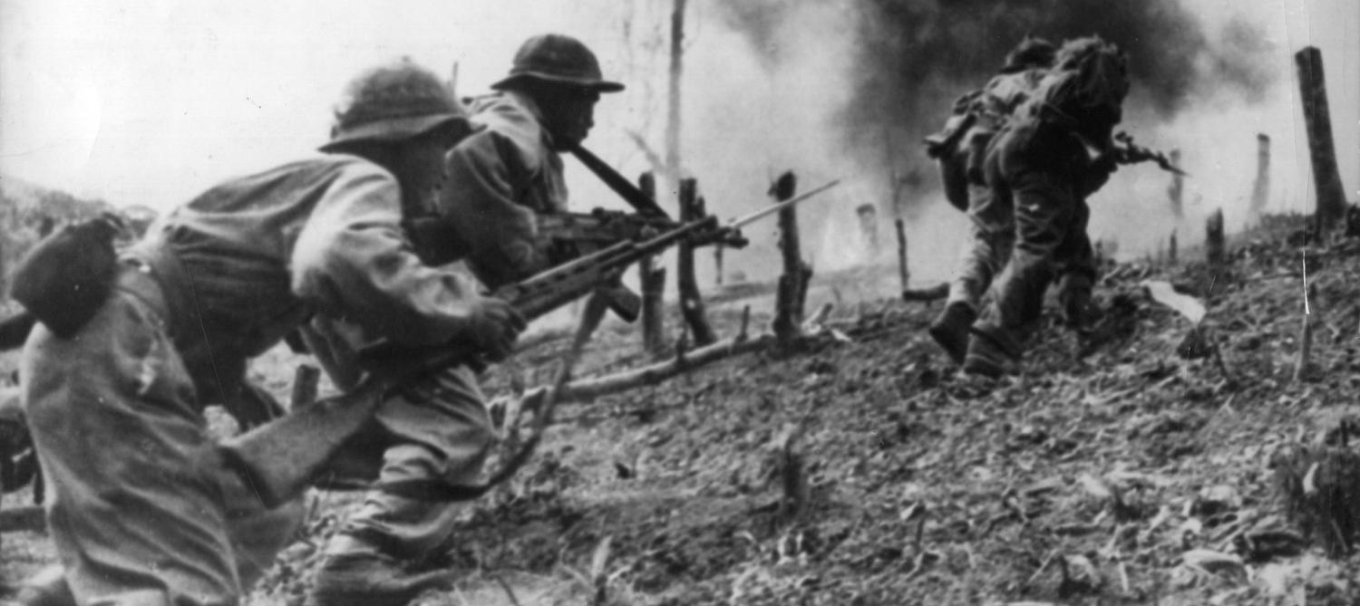North Vietnamese troops during an assault on a South Vietnamese paratroop base at Laos. (Photo by Keystone/Getty Images)