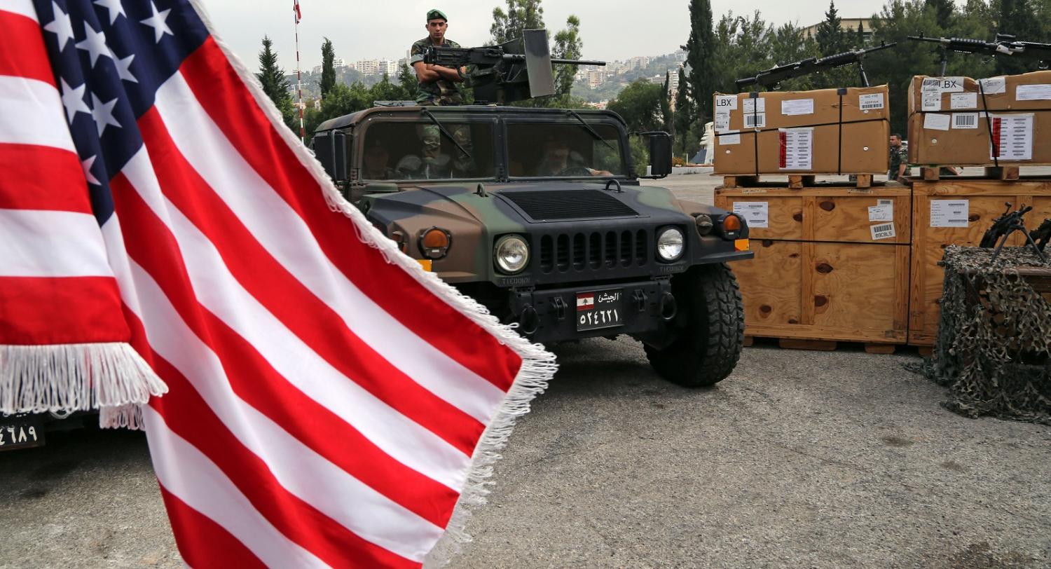 A Lebanese soldier near heavy machine guns distributed by the US Army in Beirut on 5 May. (Photo: Ratib Al Safadi/Getty Images)