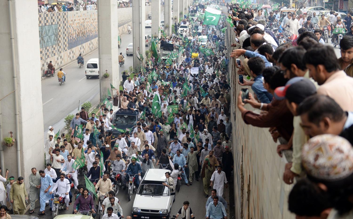 Supporters of Pakistan opposition party PTI and its chairman Imran Khan at a rally last year (Photo: Metin Aktas/Anadolu Agency/Getty Images)