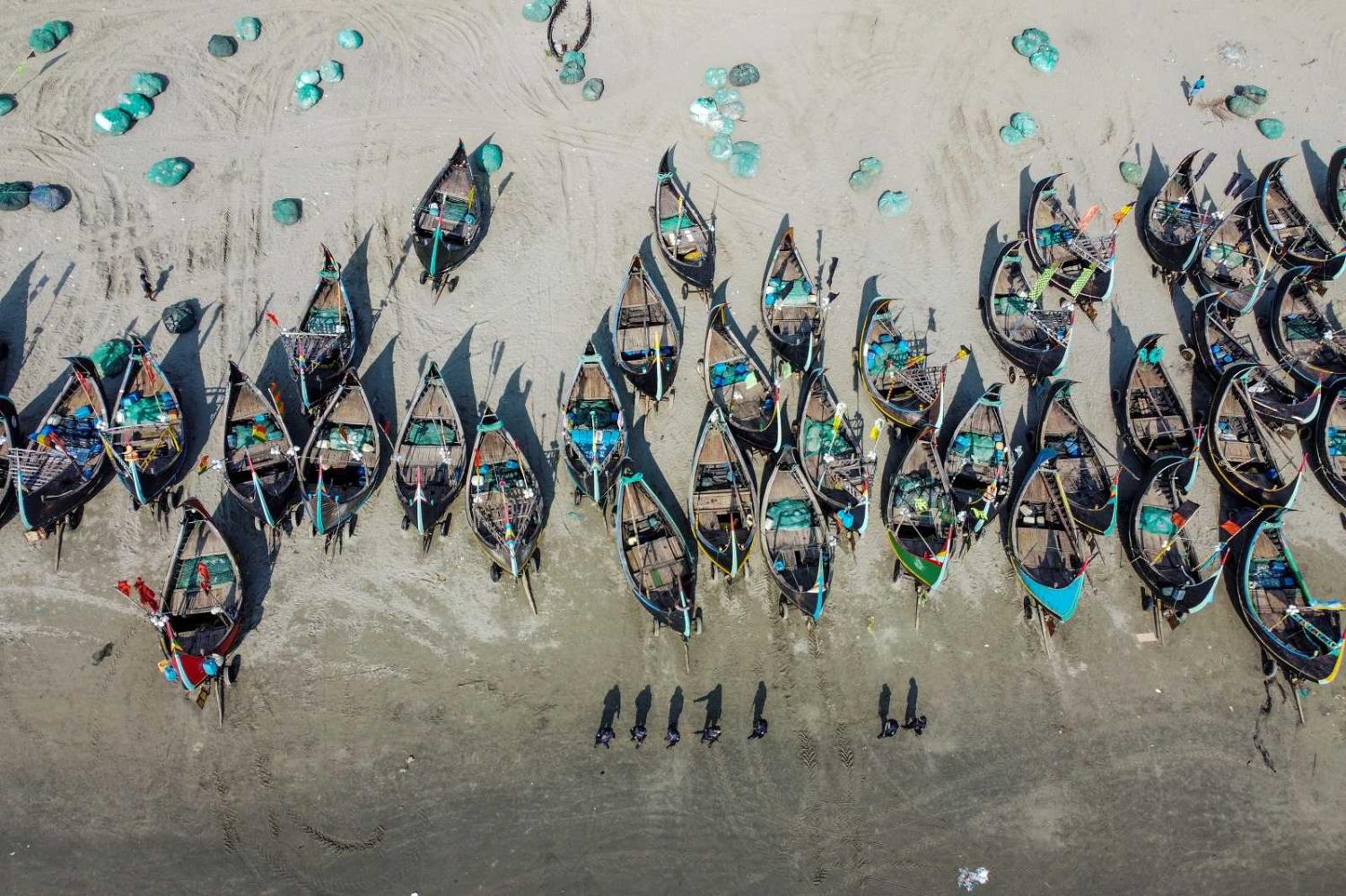 Members of the Rapid Action Battalion on patrol in Shamlapur, Bangladesh, one of the common routes used for smuggling Rohingya refugees in a complex human trafficking network, 7 October 2020 (Munir Uz Zaman/AFP via Getty Images)