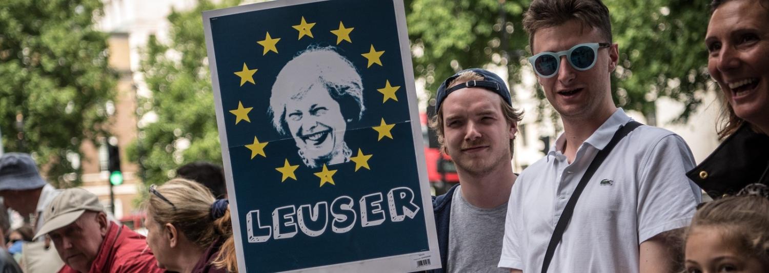 Placard outside Downing Street after a speech by British PM Theresa May on Friday after the Conservative party formed a minority government. (Photo: Carl Court/Getty Images)