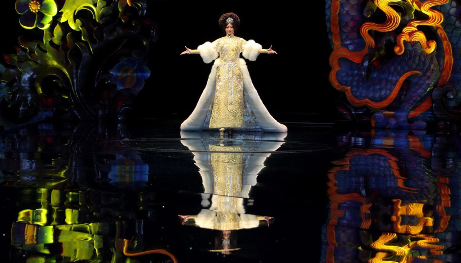 A model showcases designs on the runway during the Guo Pei 2013 Dragon Bride show in Beijing, China (Photo: VCG/Getty)