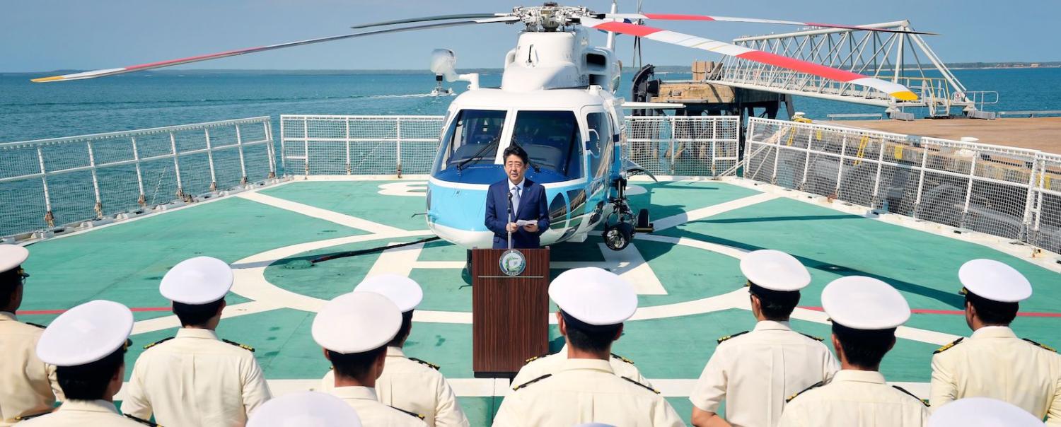 Japan's Prime Minister Shinzo Abe addresses sailors during a ship tour at Fort Hill Wharf in Darwin. (Photo: Michael Franchi/AFP/Getty)