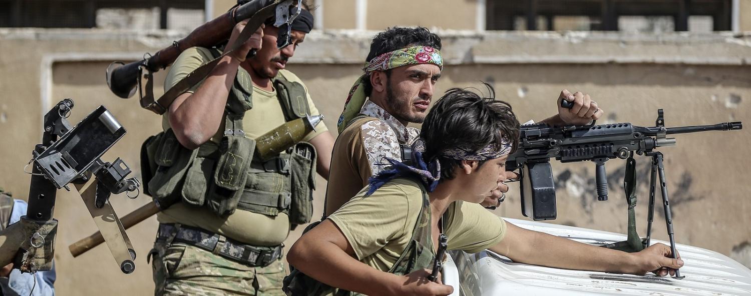 Members of opponent groups linked to Free Syrian Army in Aleppo, Syria in October last year.  (Photo: Emin Sansar/Getty Images)