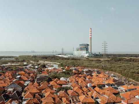 The fishing village of Waruduwur and the nearby Cirebon-1 coal-fired power plant in Cirebon, West Java, Indonesia (Muhammad Fadli/Bloomberg via Getty Images)
